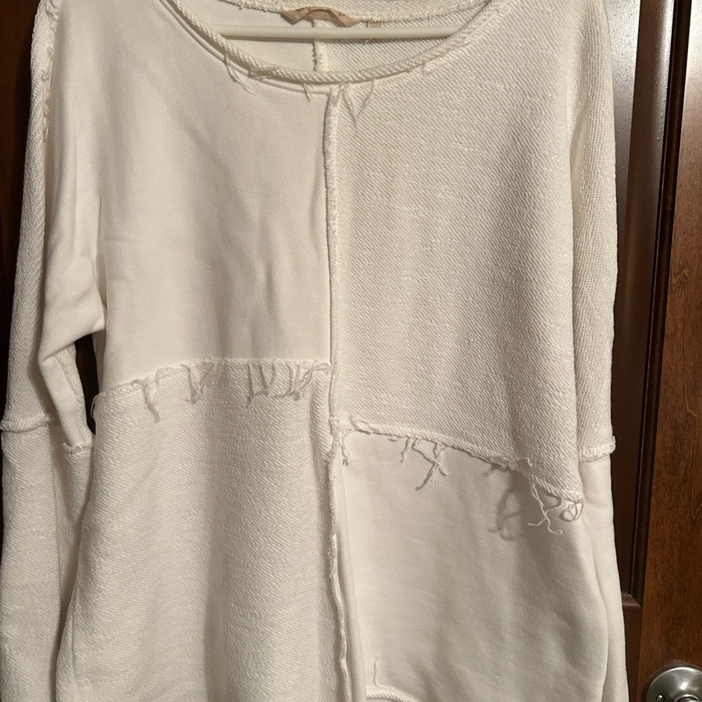 Warm white top.